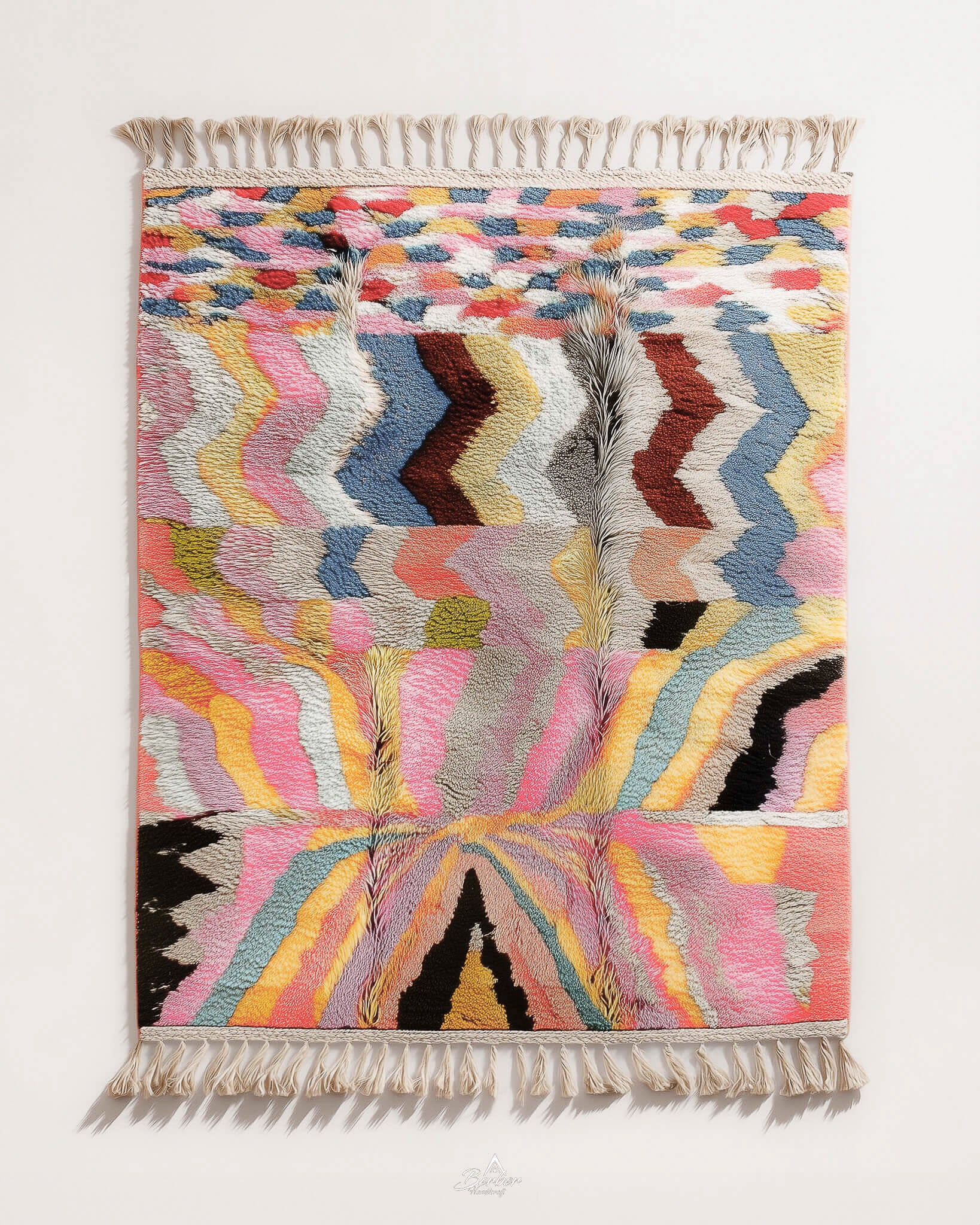 Multicolored abstract pink moroccan rug with fringe on a white background
