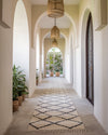 Moroccan rug runner on a long hallway