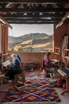 Berber crafstmen weaving rugs