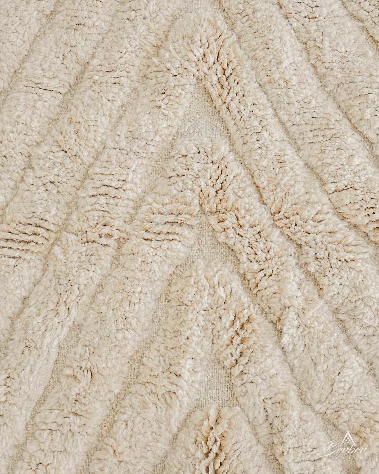 Close-up of textured beige fabric with wavy pattern