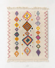 Decorative Azilal rug with colorful geometric pattern on a white background